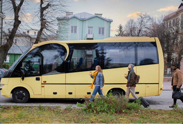 Minibus with driver collecting a group for a Gatwick Airport transfer