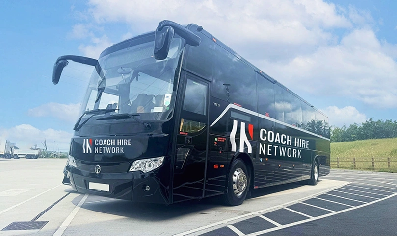 Full-size coach to Manchester Airport for a school group transfer