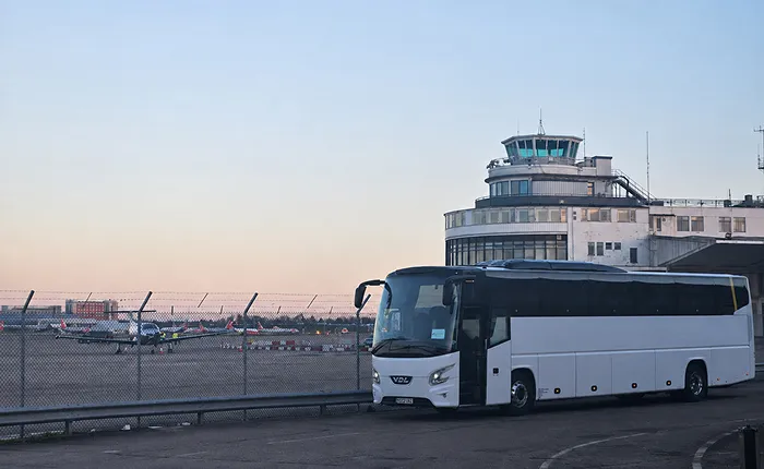 Full-size coach to Newcastle Airport for a school group transfer